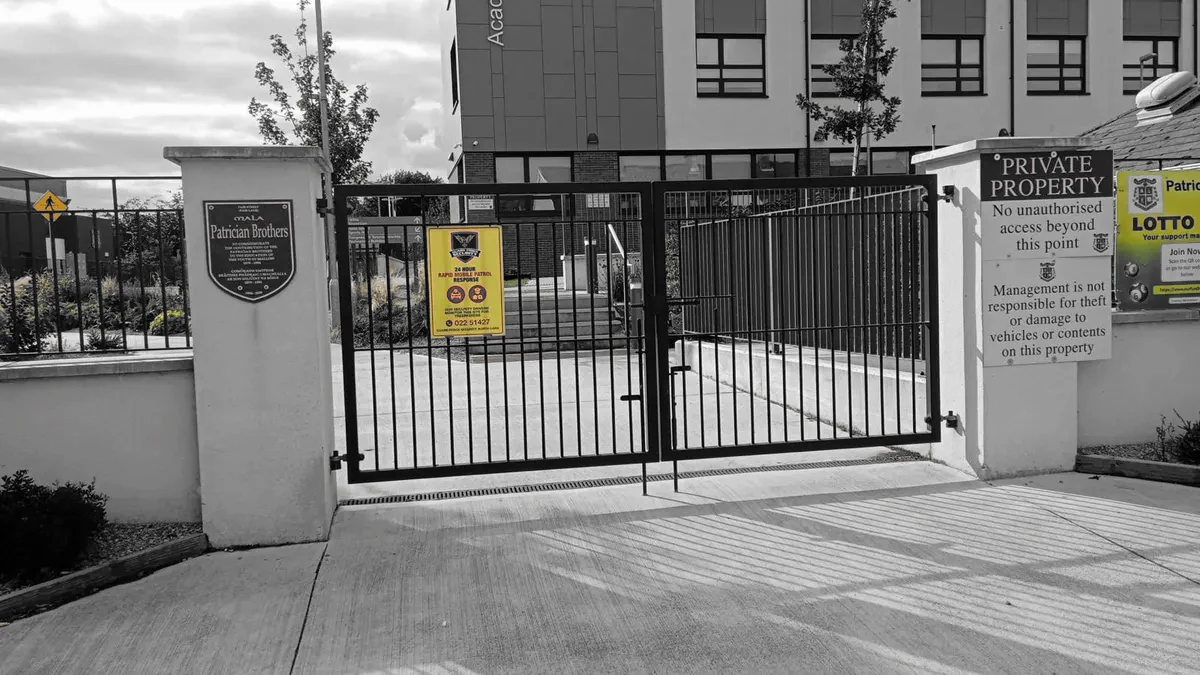 Guard Force Security patrol signage at school and academy gates in Mallow